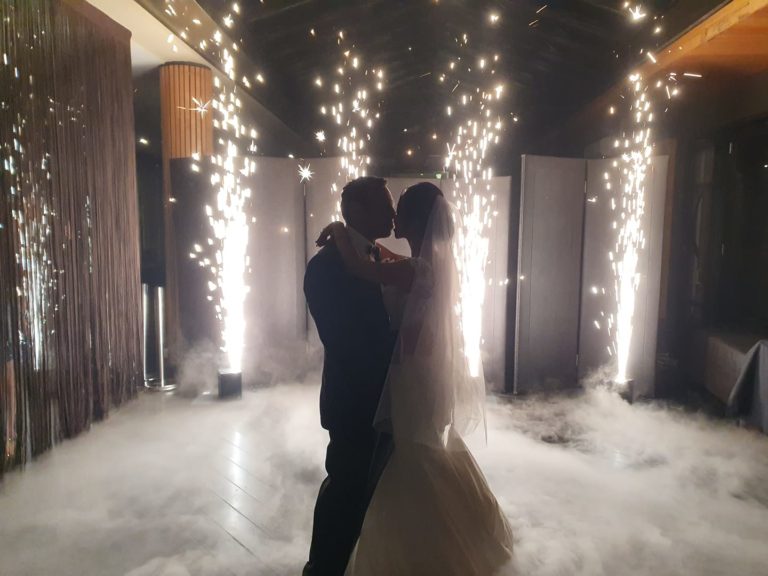 Wedding Couple Kissing with Fireworks
